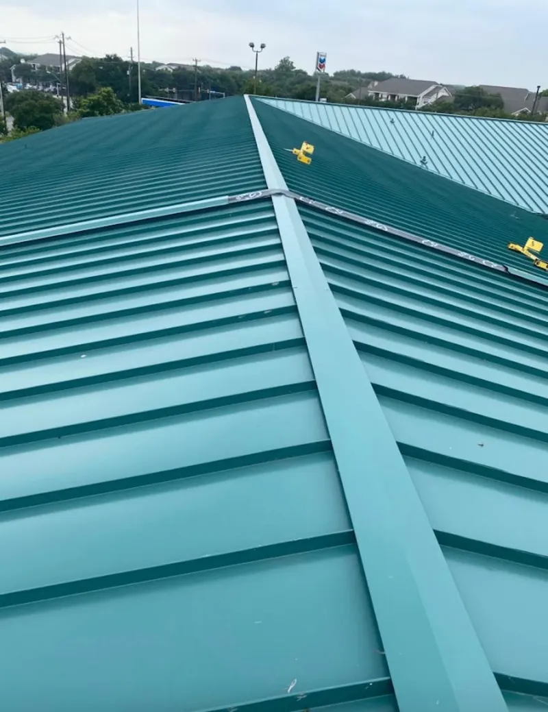 Green commercial metal roof ridge and valley for Metal Roof Repair in Cocoa Beach